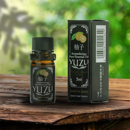 Yuzu fragrance oil in a clear glass bottle, showcasing the natural citrus scent and aromatic profile of AKJAPAN Shop's fragrance oil.